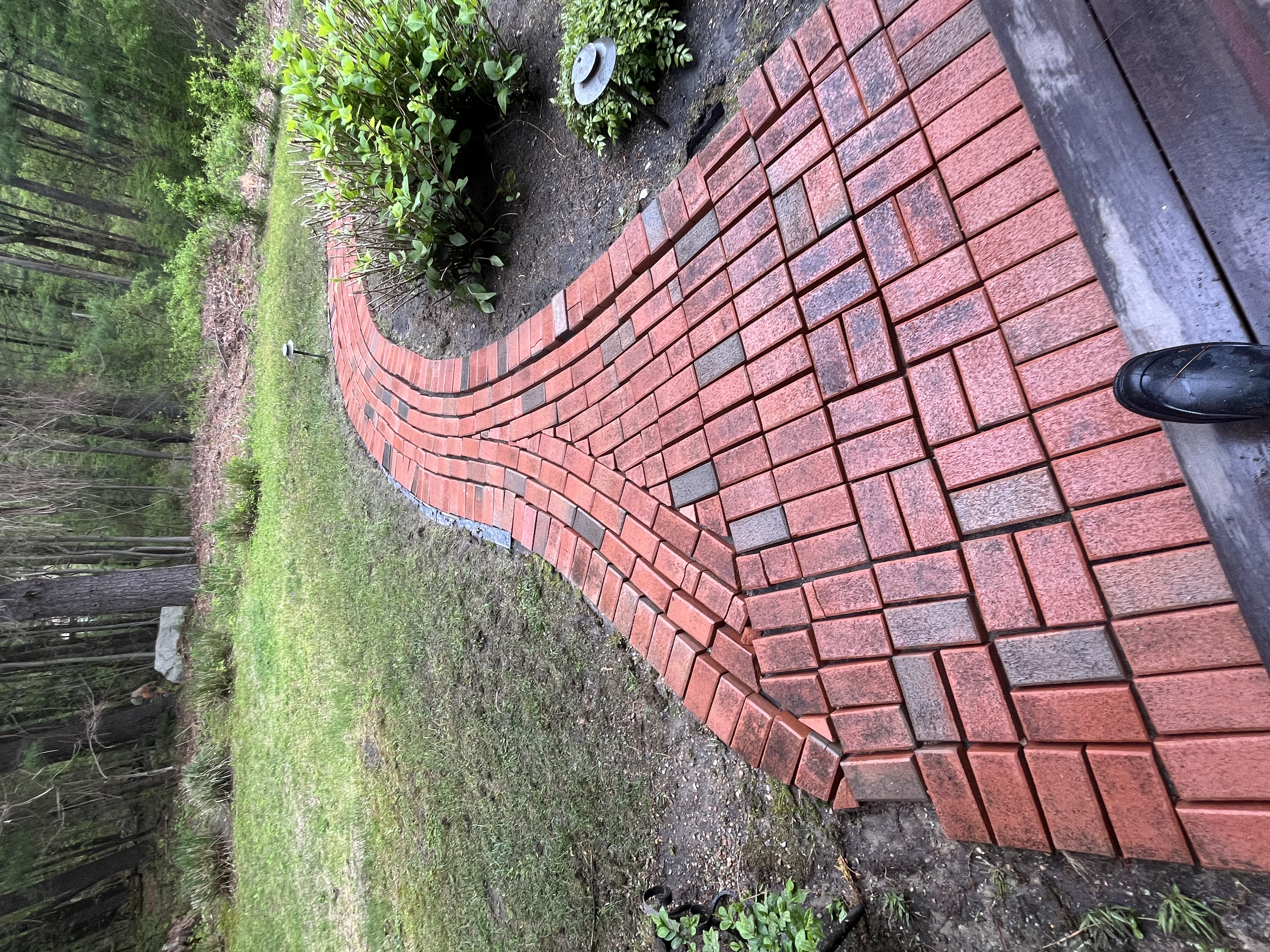 Walkway after H2WOAH cleaning — clean bright bricks