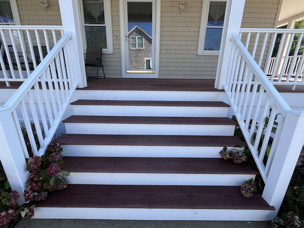 After beach house Trex deck cleaning in Marshfield MA by H2WOAH Exterior Cleaning showing a clean coastal deck