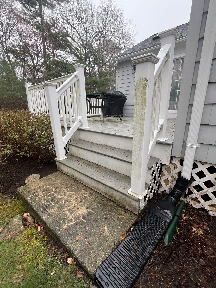 Before composite deck cleaning in Marshfield MA showing algae and buildup on decking boards