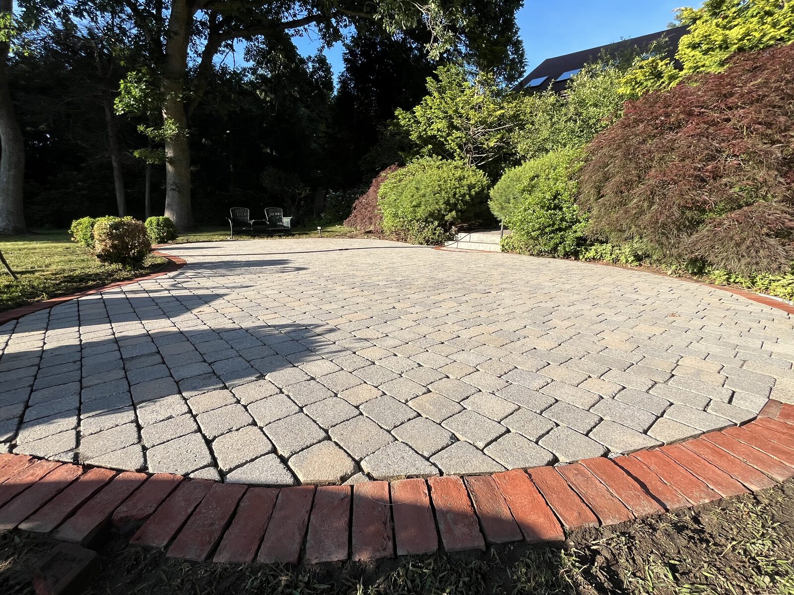 Patio and brick walkway cleaning in Marshfield, MA by H2WOAH Exterior Cleaning