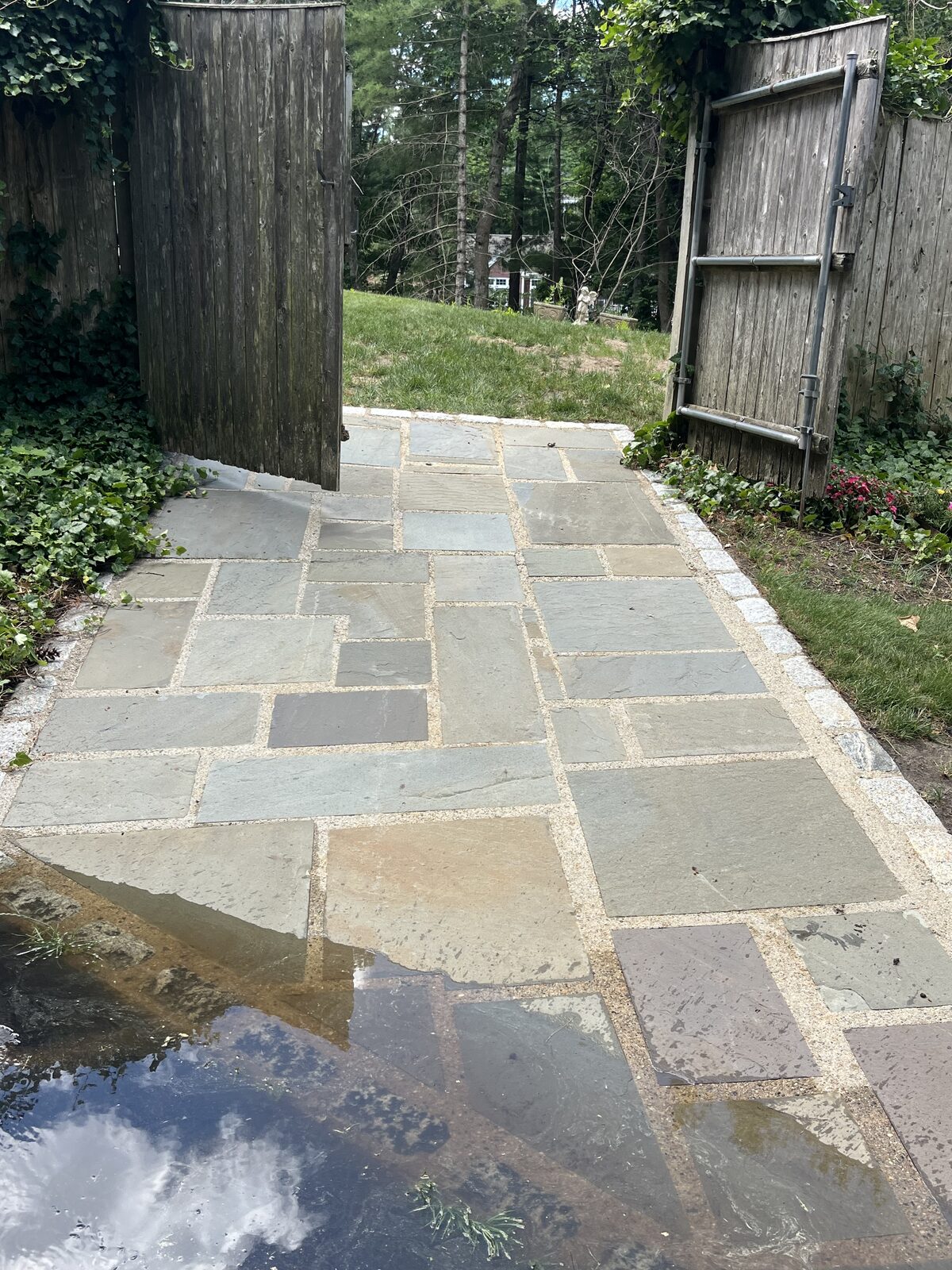 Stone walkway after exterior cleaning in Marshfield MA by H2WOAH Exterior Cleaning